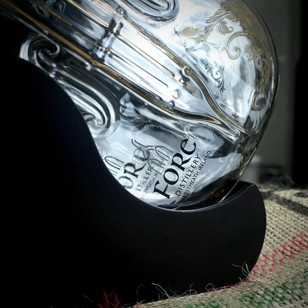 Fore Distillery Globe Decanter nested in a frame